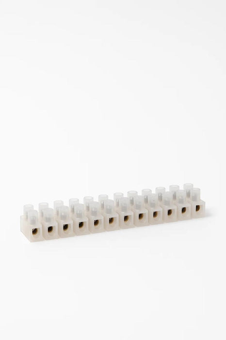 Side on shot of a 5 AMP, 12 way connector strip.