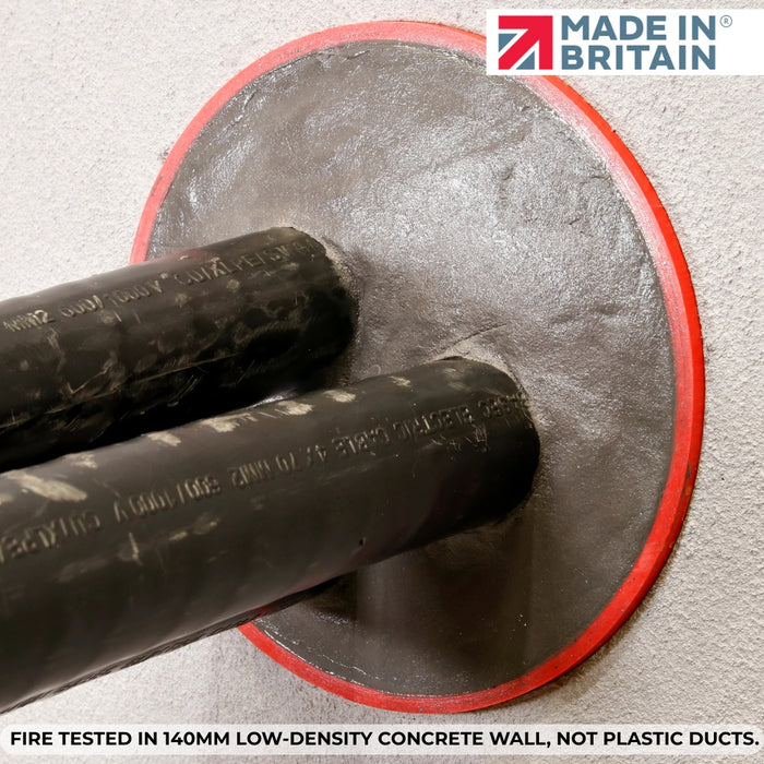 Sealed cables with fire-resistant compound in a 140mm concrete wall, demonstrating fire-tested duct sealing and smooth surface finish.
