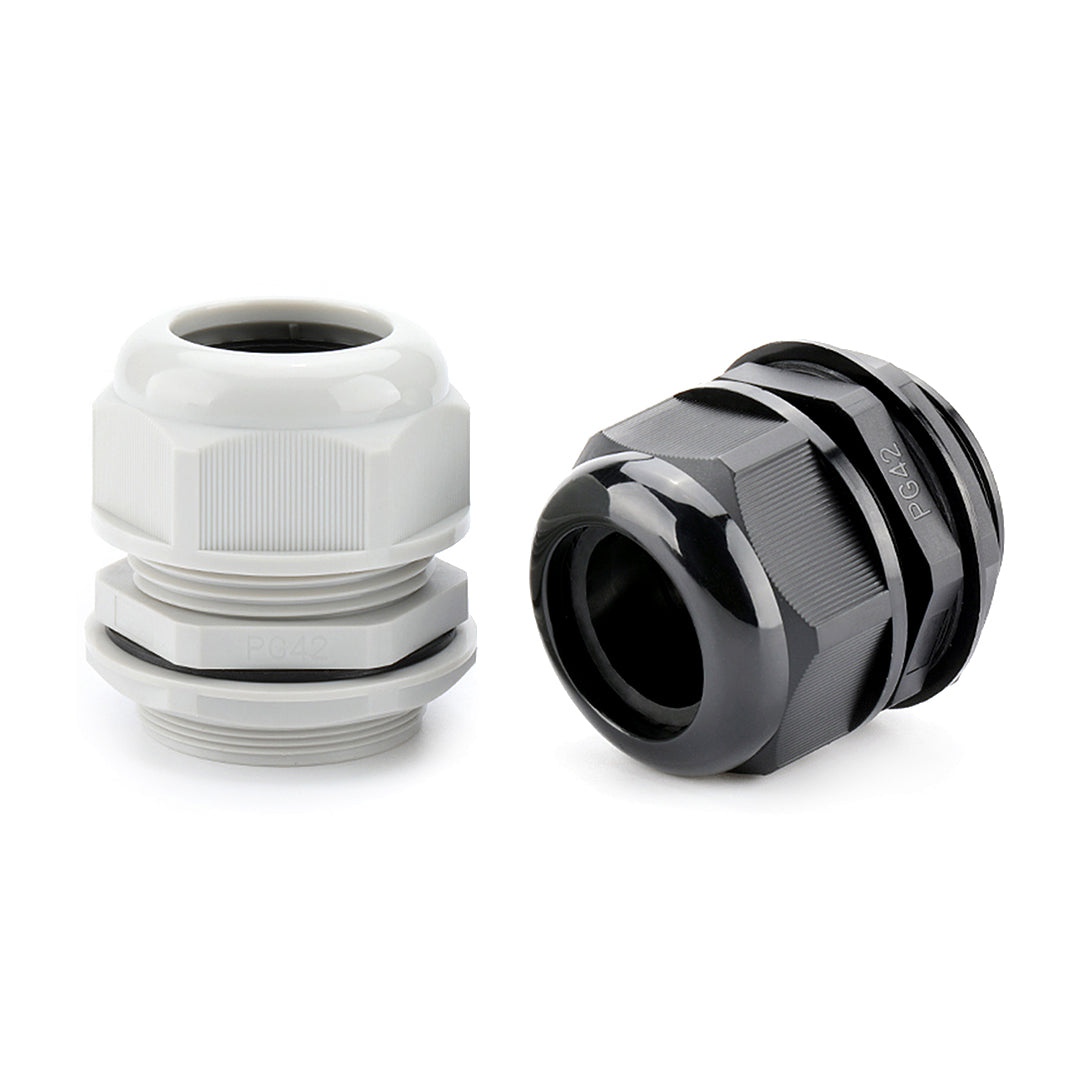 Two nylon cable glands in black and white, designed for securing and sealing electrical cables in industrial or commercial enclosures.