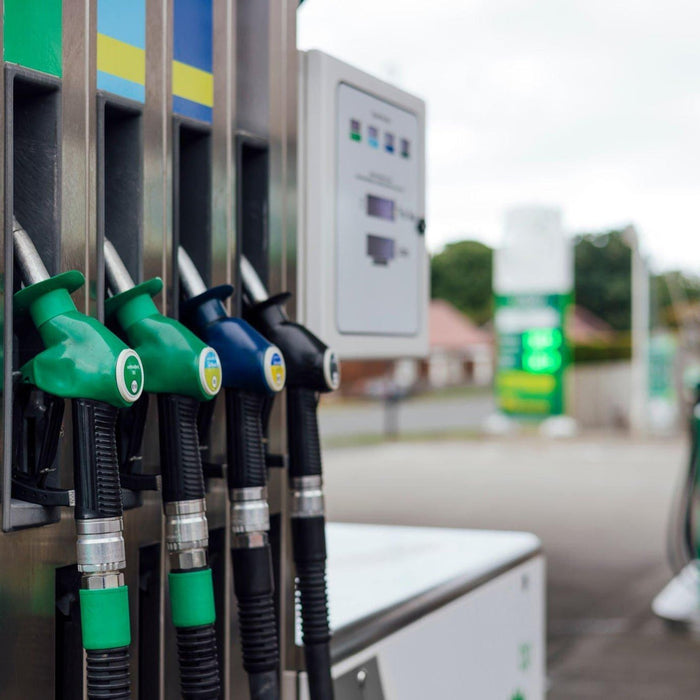 Fuel pumps at a modern filling station illustrating cable duct sealing compliance under the APEA & Energy Institute’s Blue Book safety standards.