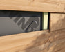 Airtight cable grommet sealed through DAFA TriFlex membrane behind timber cladding, showing a single cable pass-through.